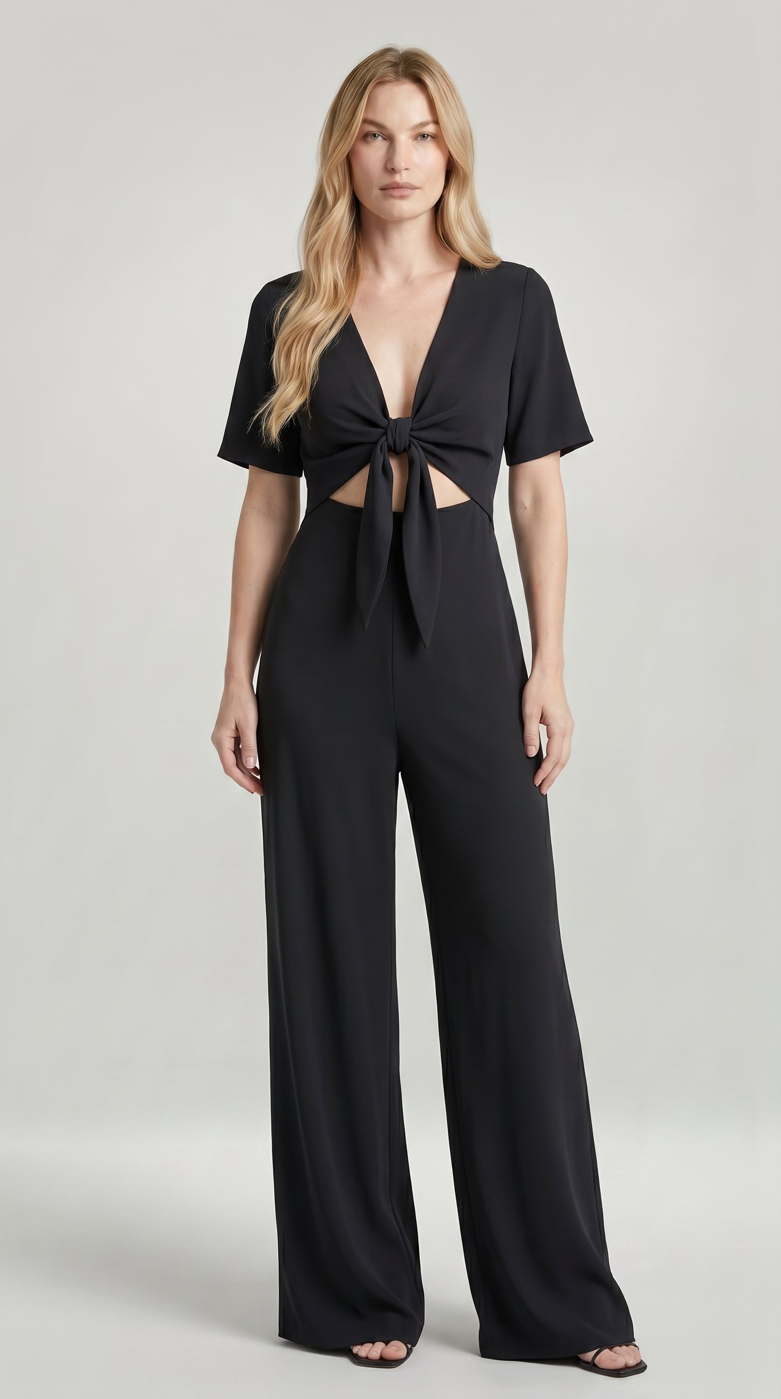 FLUID CUT-OUT JUMPSUIT WITH TIE