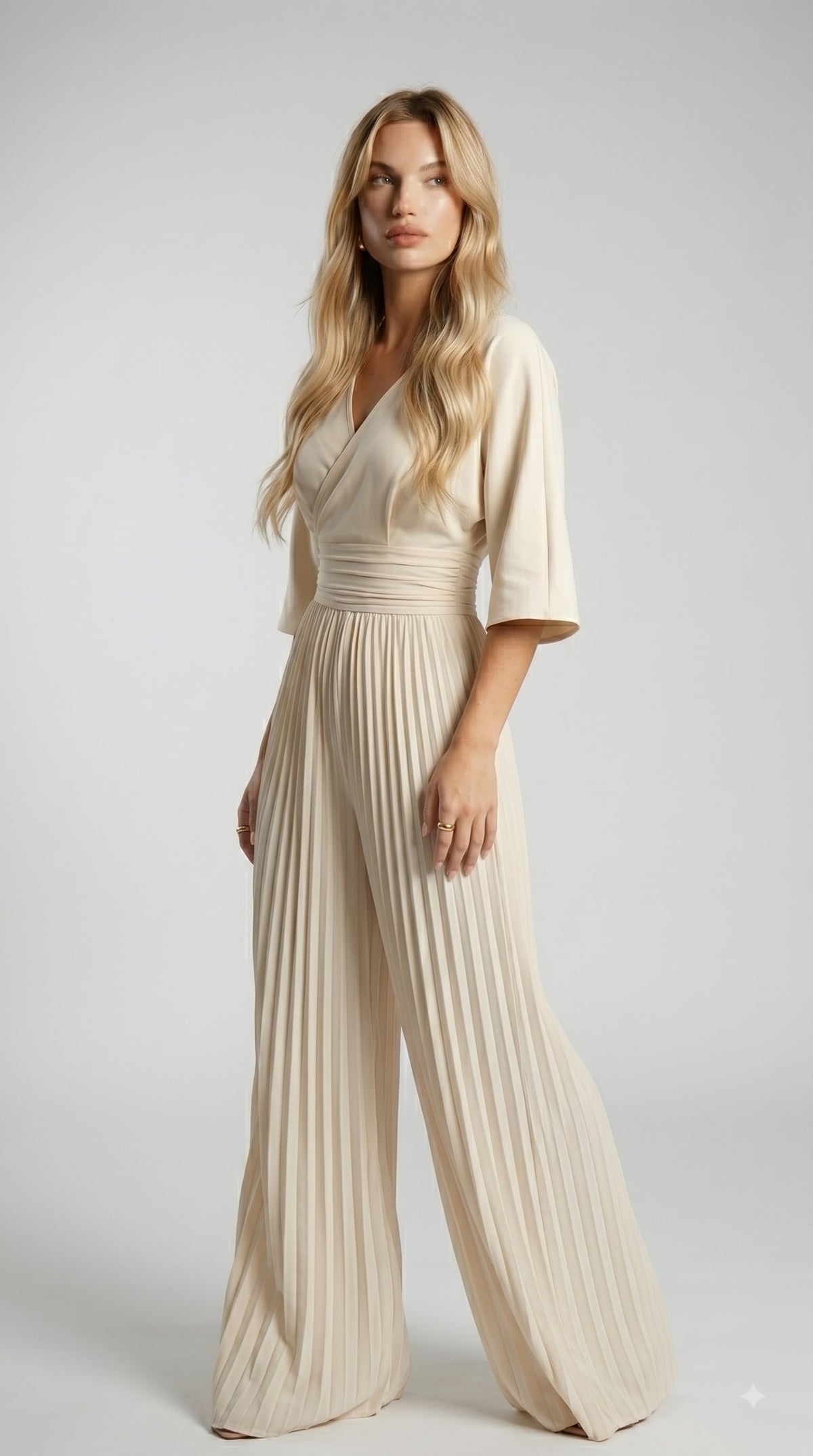 Élan Jumpsuit mit Falten und weitem Bein